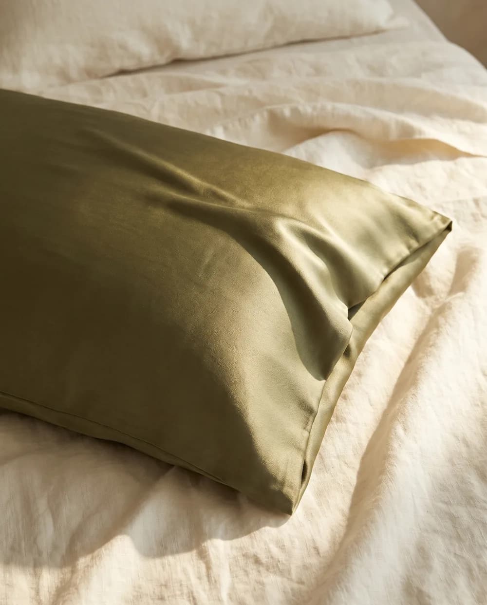 An olive green mulberry silk pillowcase