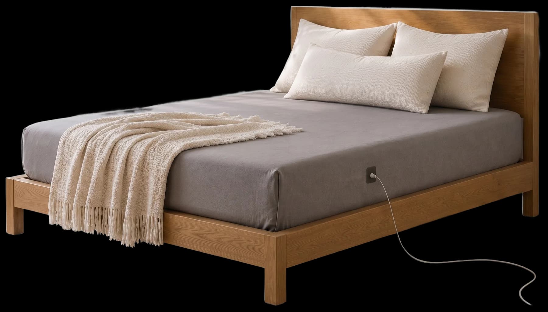 A grey fitted grounding sheet on a light oak bed